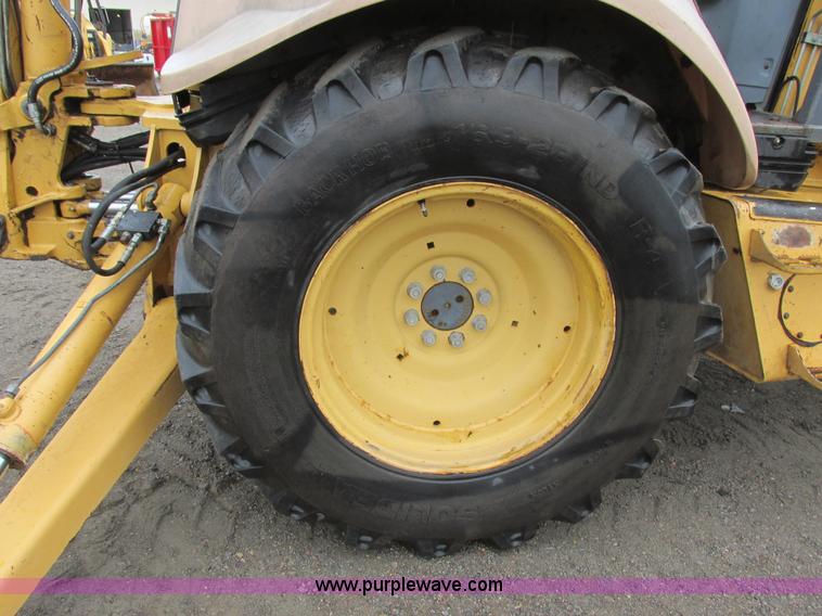 image for item I6033 1999 New Holland 655E backhoe