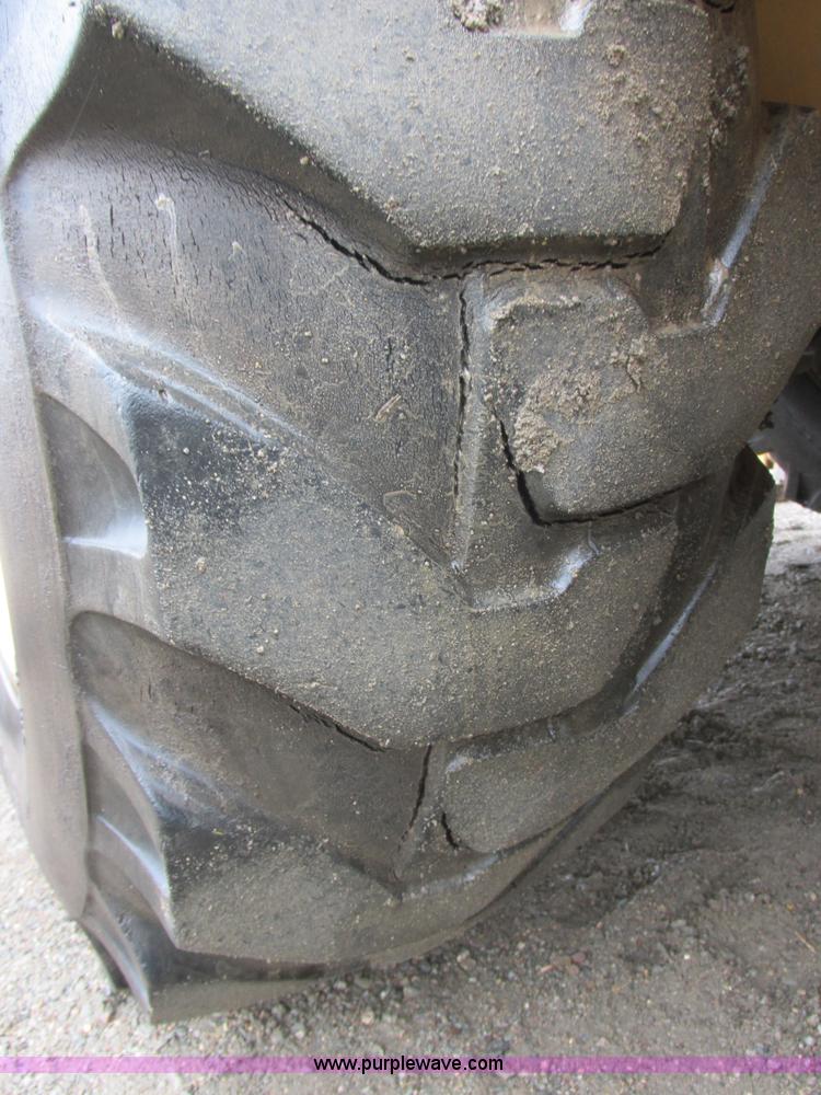 image for item I6033 1999 New Holland 655E backhoe