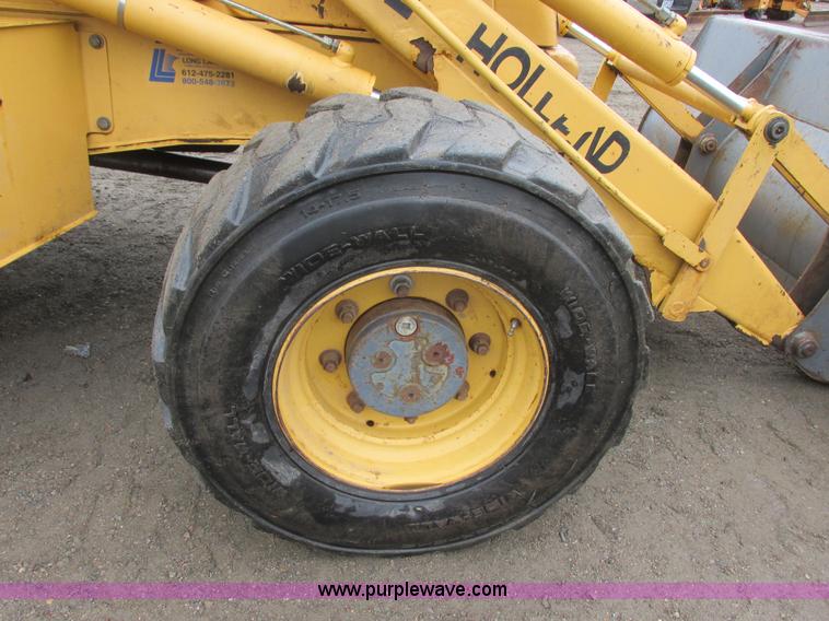 image for item I6033 1999 New Holland 655E backhoe