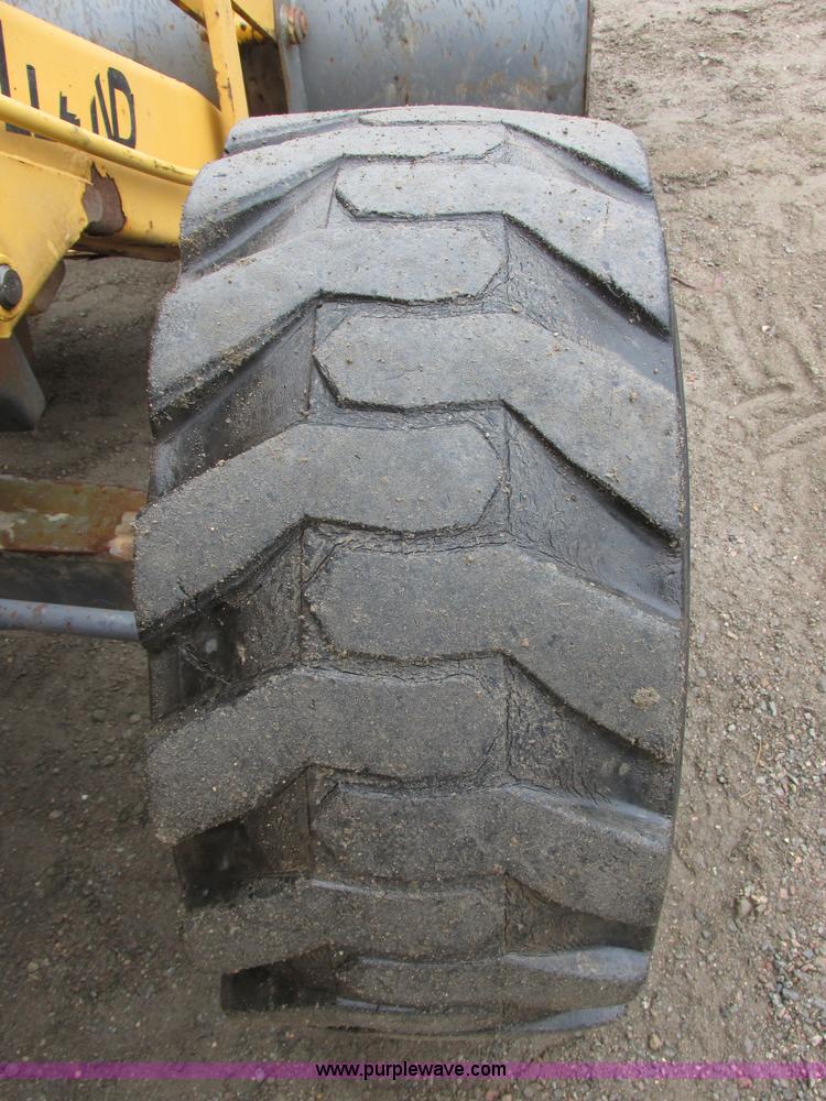 image for item I6033 1999 New Holland 655E backhoe