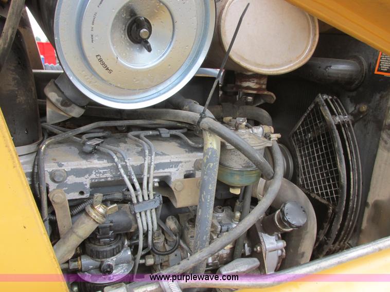 image for item I6033 1999 New Holland 655E backhoe