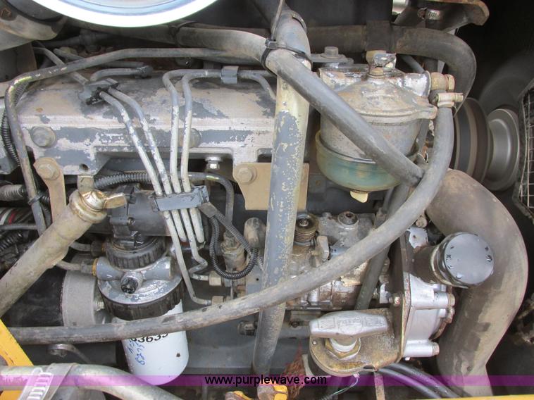 image for item I6033 1999 New Holland 655E backhoe