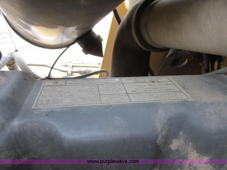 image for item I6033 1999 New Holland 655E backhoe