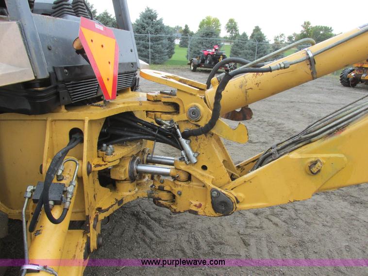 image for item I6033 1999 New Holland 655E backhoe