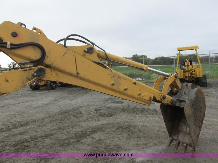 image for item I6033 1999 New Holland 655E backhoe