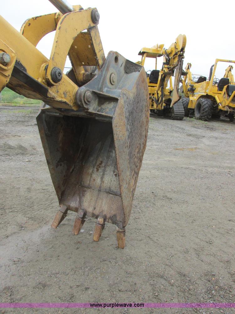 image for item I6033 1999 New Holland 655E backhoe