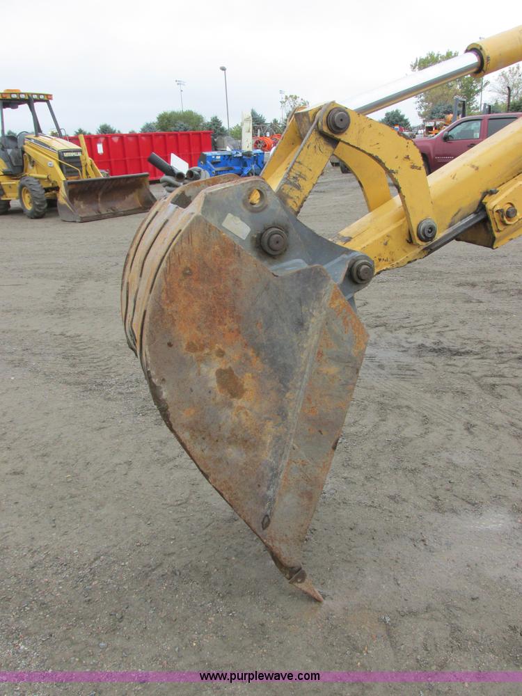 image for item I6033 1999 New Holland 655E backhoe