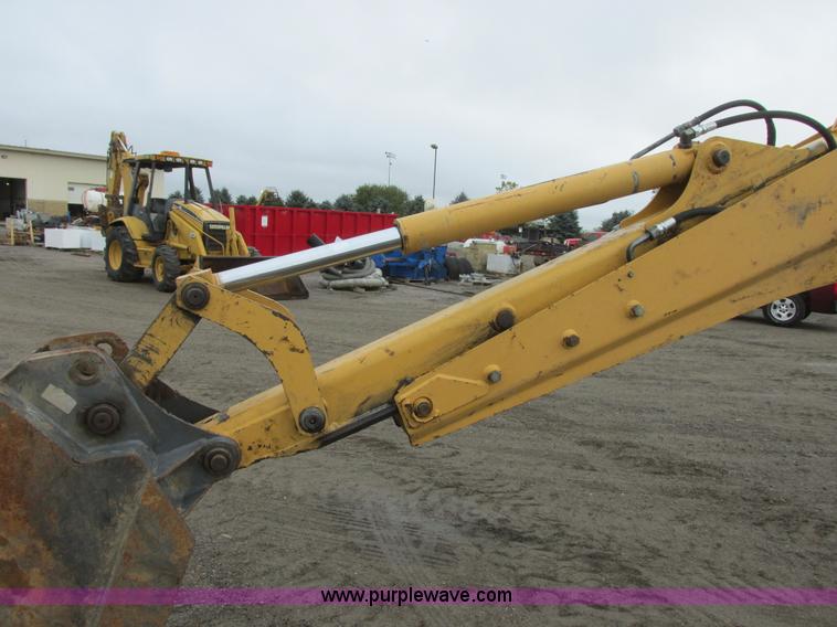 image for item I6033 1999 New Holland 655E backhoe