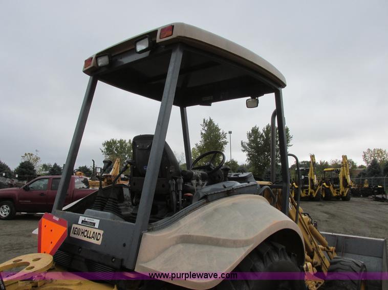 image for item I6033 1999 New Holland 655E backhoe