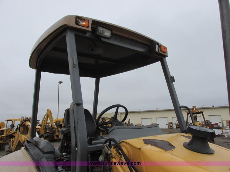 image for item I6033 1999 New Holland 655E backhoe