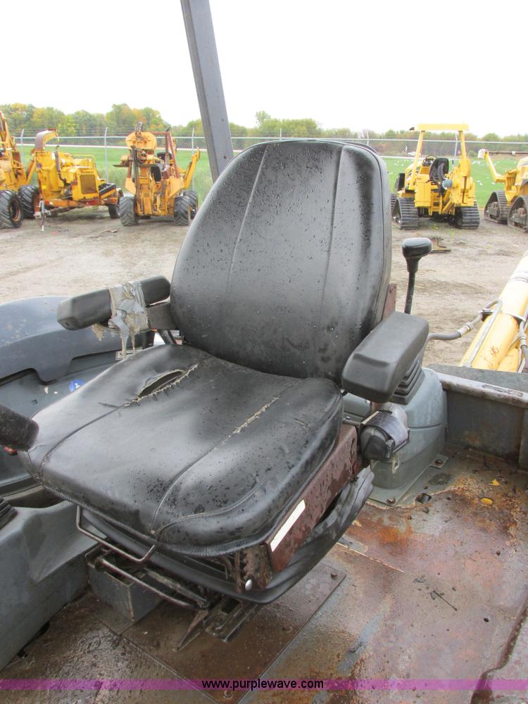 image for item I6033 1999 New Holland 655E backhoe