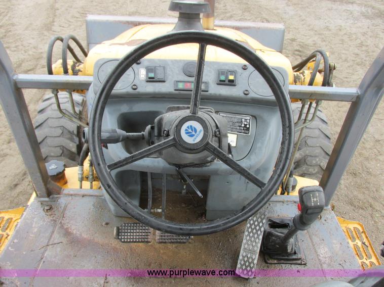 image for item I6033 1999 New Holland 655E backhoe