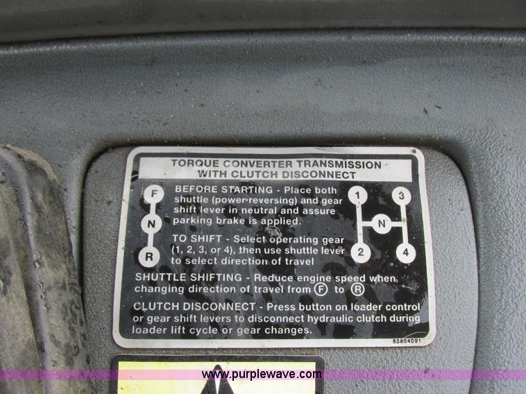 image for item I6033 1999 New Holland 655E backhoe