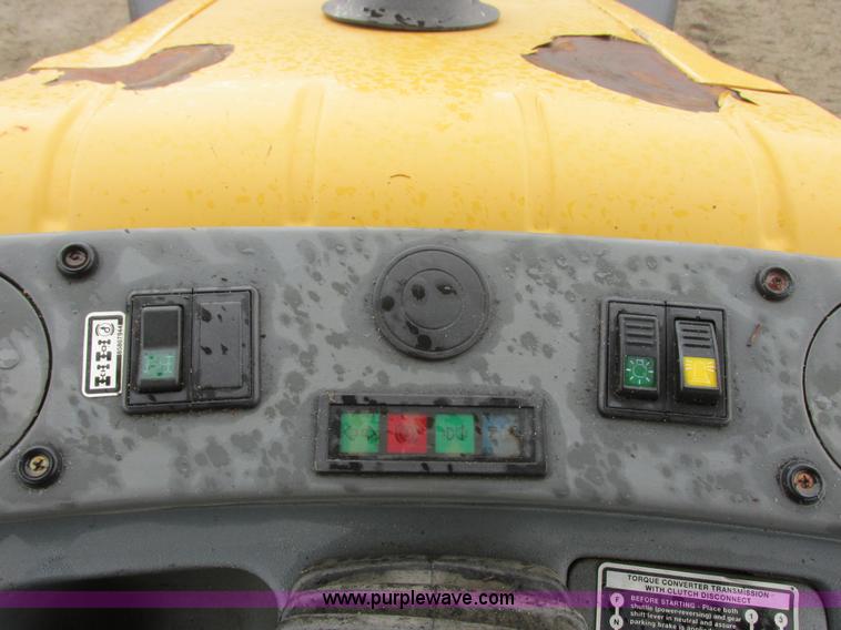 image for item I6033 1999 New Holland 655E backhoe