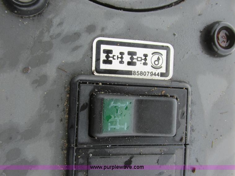 image for item I6033 1999 New Holland 655E backhoe