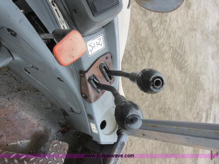 image for item I6033 1999 New Holland 655E backhoe