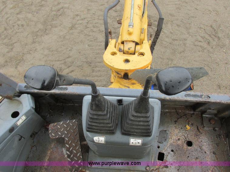 image for item I6033 1999 New Holland 655E backhoe