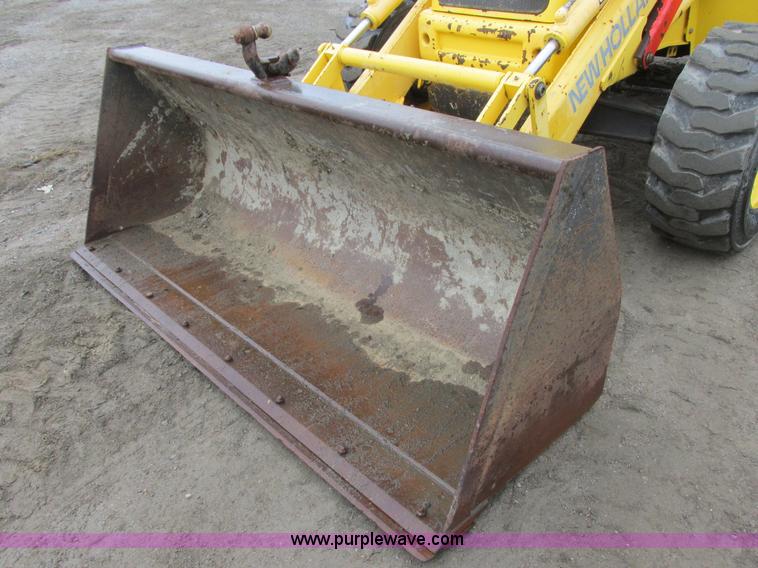 image for item I6036 2005 New Holland LB75B backhoe