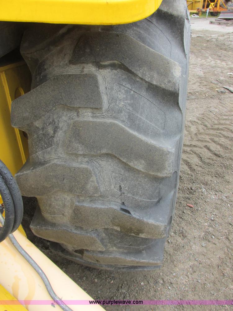 image for item I6036 2005 New Holland LB75B backhoe