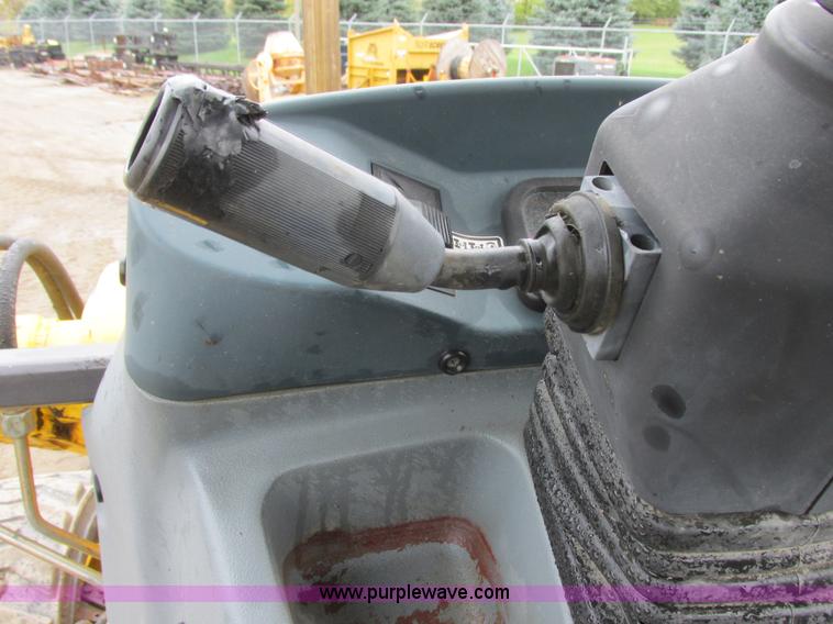 image for item I6036 2005 New Holland LB75B backhoe