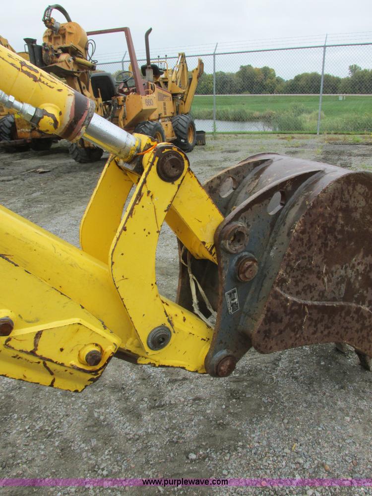 image for item I6036 2005 New Holland LB75B backhoe