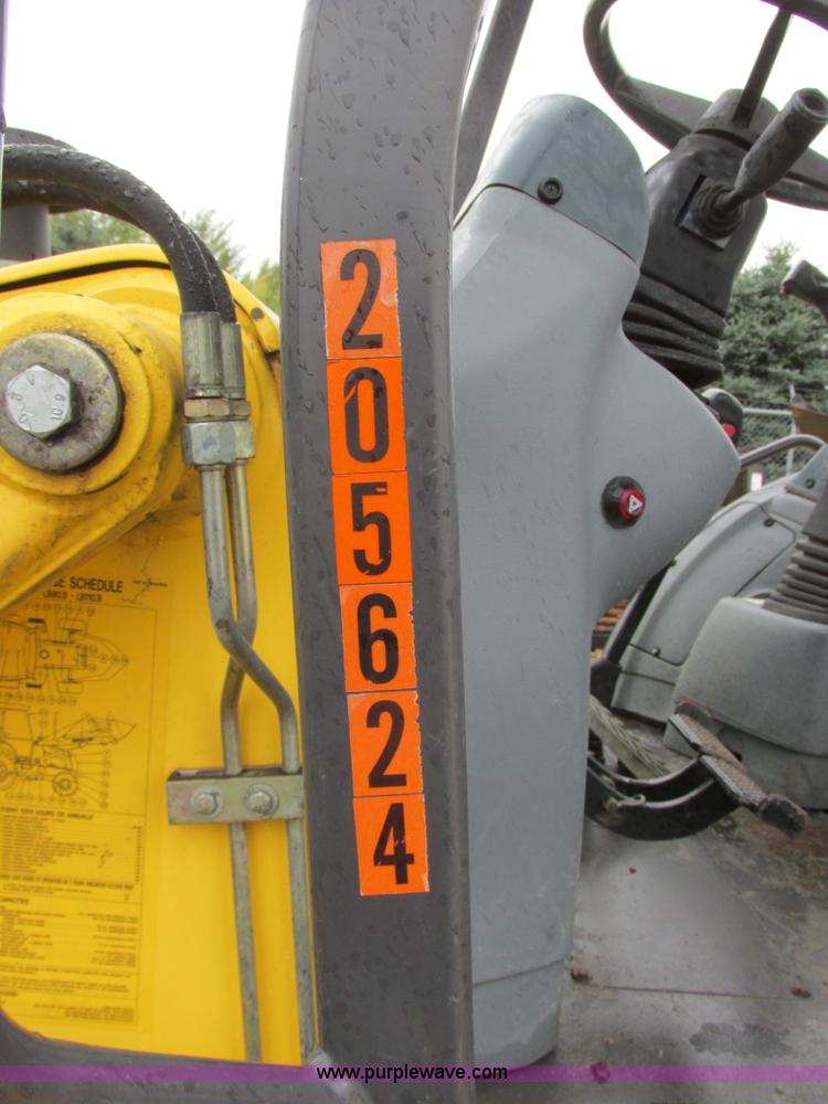 image for item I6036 2005 New Holland LB75B backhoe