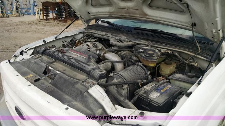 image for item AY9488 2004 Ford F350 Super Duty SuperCab utility truck