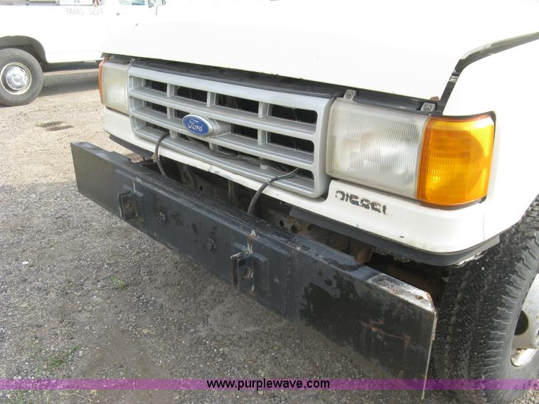 image for item E7996 1990 Ford F450 Super Duty dump flatbed truck