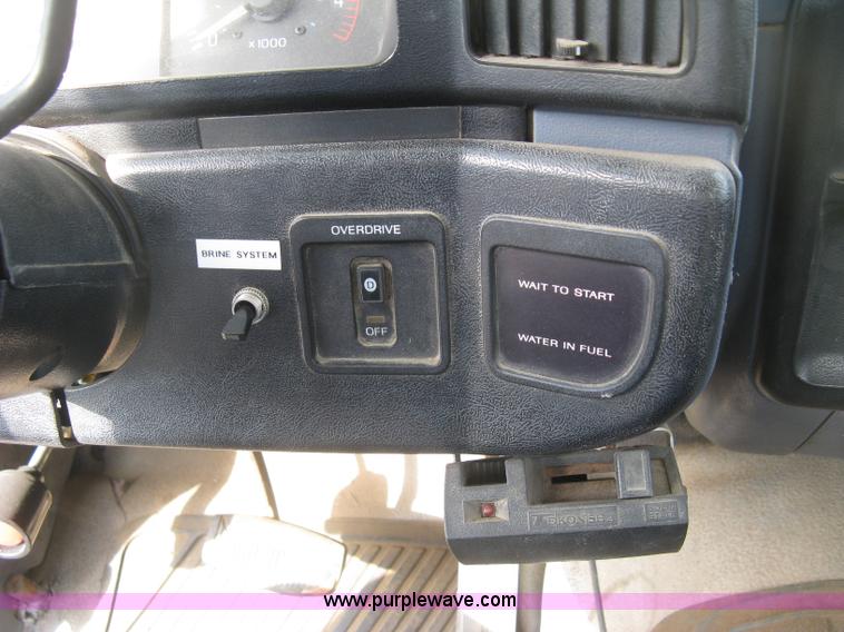 image for item E7996 1990 Ford F450 Super Duty dump flatbed truck