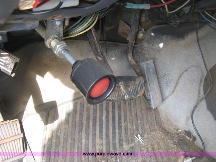 image for item E7996 1990 Ford F450 Super Duty dump flatbed truck