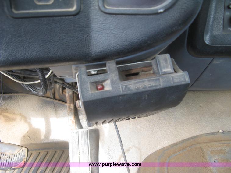 image for item E7996 1990 Ford F450 Super Duty dump flatbed truck