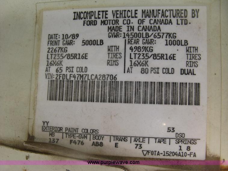 image for item E7996 1990 Ford F450 Super Duty dump flatbed truck