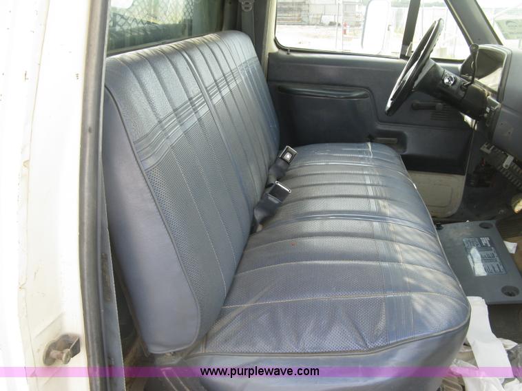 image for item E7996 1990 Ford F450 Super Duty dump flatbed truck