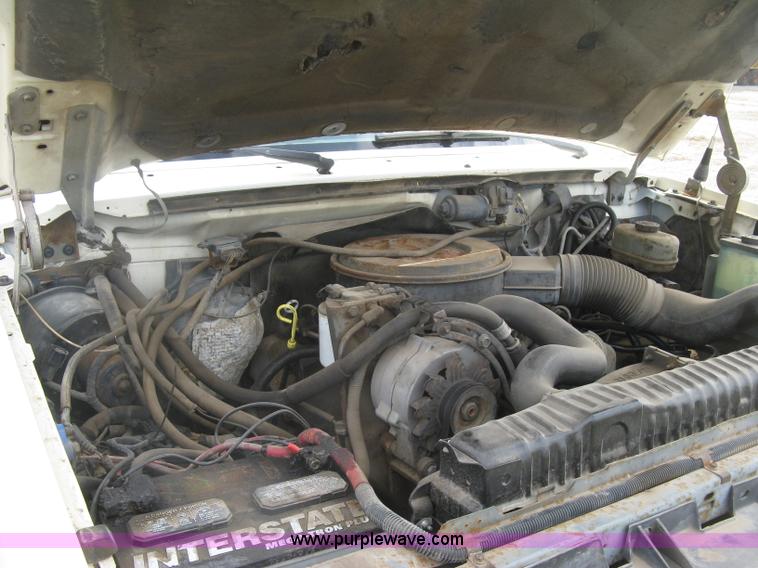 image for item E7996 1990 Ford F450 Super Duty dump flatbed truck