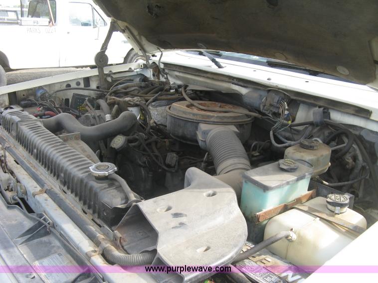 image for item E7996 1990 Ford F450 Super Duty dump flatbed truck