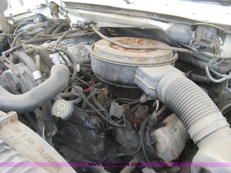 image for item E7996 1990 Ford F450 Super Duty dump flatbed truck