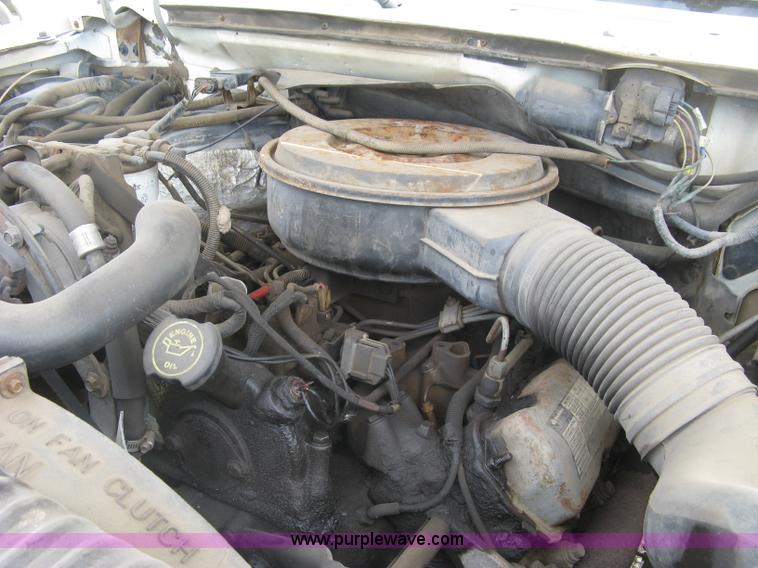 image for item E7996 1990 Ford F450 Super Duty dump flatbed truck