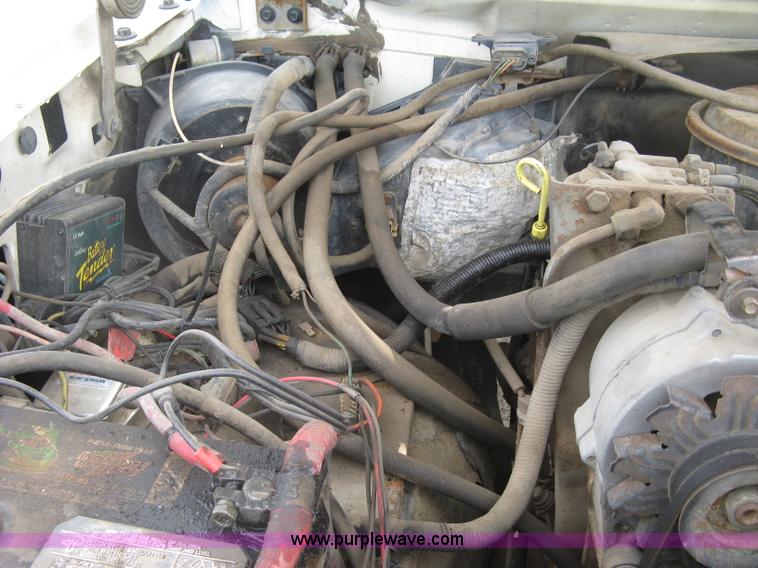 image for item E7996 1990 Ford F450 Super Duty dump flatbed truck