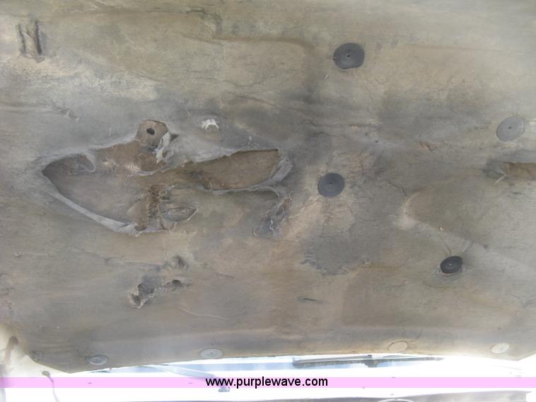 image for item E7996 1990 Ford F450 Super Duty dump flatbed truck