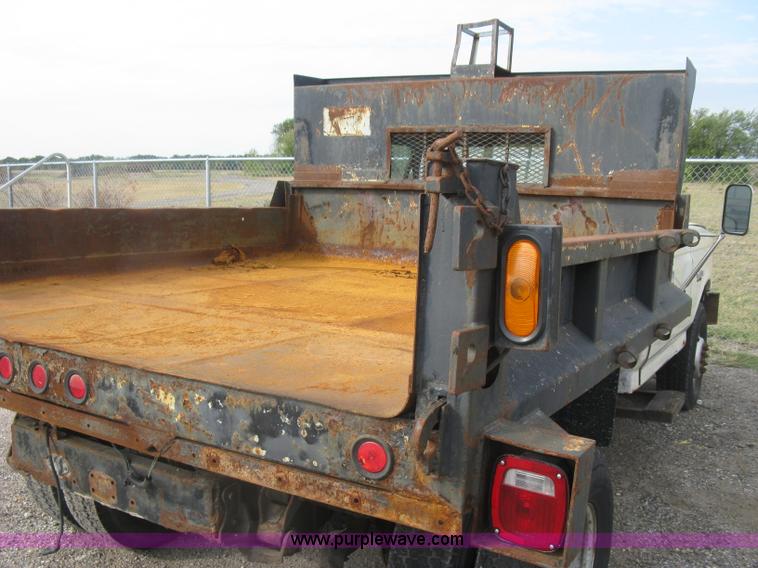 image for item E7996 1990 Ford F450 Super Duty dump flatbed truck