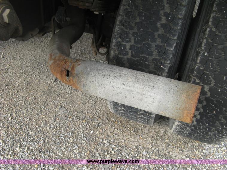 image for item E7996 1990 Ford F450 Super Duty dump flatbed truck