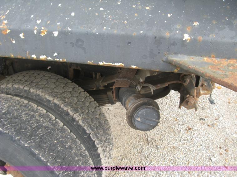 image for item E7996 1990 Ford F450 Super Duty dump flatbed truck