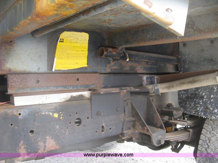 image for item E7996 1990 Ford F450 Super Duty dump flatbed truck