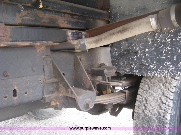 image for item E7996 1990 Ford F450 Super Duty dump flatbed truck