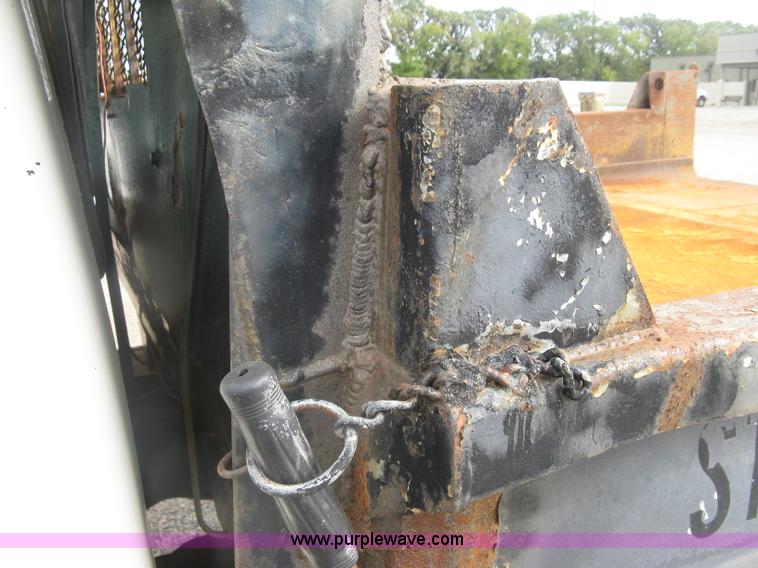 image for item E7996 1990 Ford F450 Super Duty dump flatbed truck