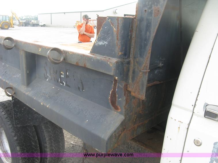 image for item E7996 1990 Ford F450 Super Duty dump flatbed truck