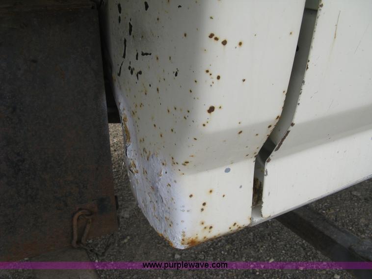 image for item E7996 1990 Ford F450 Super Duty dump flatbed truck