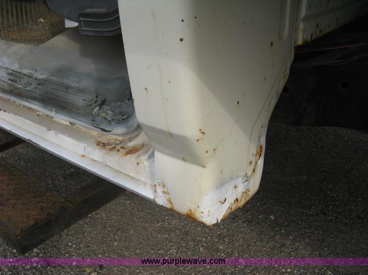 image for item E7996 1990 Ford F450 Super Duty dump flatbed truck