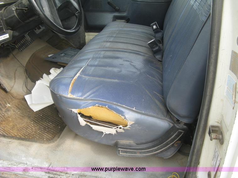 image for item E7996 1990 Ford F450 Super Duty dump flatbed truck