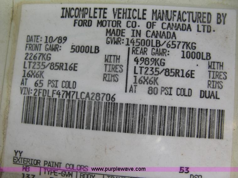 image for item E7996 1990 Ford F450 Super Duty dump flatbed truck